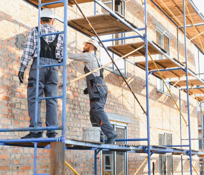Scaffolding tower uses shown on Bladez steel scaffolding at a Pune construction site